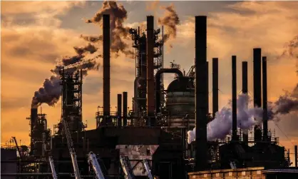  ?? Photograph: Barry Lewis/In Pictures/Getty Images ?? ExxonMobil oil refinery in Baton Rouge: Storebrand CEO says companies such as Exxon are ‘holding us back’.