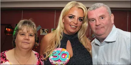  ??  ?? Gemma McShane with her parents Fiona and Gerard McAlester at Gemma’s 30th birthday party in the Lisdoo.