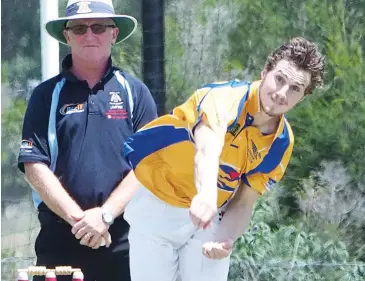  ??  ?? Ellinbank’s Sean Masterson bowls during the division one match against Drouin.