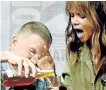  ?? KEVIN WINTER/GETTY IMAGES ?? Actor Channing Tatum, left, pours actor Halle Berry a drink onstage at the 20th Century FOX panel during Comic-Con Internatio­nal 2017 at San Diego Convention Center on Thursday in San Diego, California.