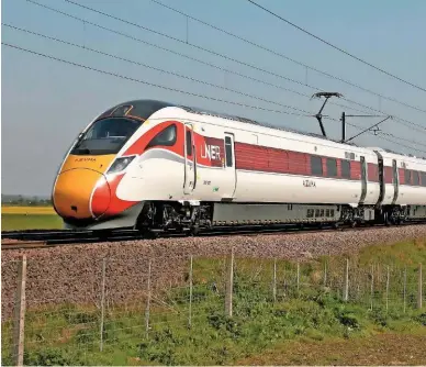  ?? PAUL BIGGS. ?? LNER Azuma 800102 passes Claypole (near Newark) on the East Coast Main Line on April 22, with a Peterborou­gh-York test run. The company has admitted to a few teething problems as crew gets used to the new trains.