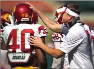  ?? RICK LOOMIS/TRIBUNE NEWS SERVICE ?? Justin Wilcox, right, seen here as USC's defensive coordinato­r in 2014, is the newest head coach for Cal football.