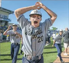  ?? Steph Chambers/Post-Gazette ?? Ringgold’s Chase Angotti reacts after beating Valley View in the PIAA Class 4A baseball championsh­ip June 14 at Medlar Field at Lubrano Park at Penn State University.