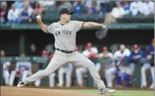  ?? AP photo ?? Yankees starting pitcher Gerrit Cole throws during the first inning of New York’s 4-2 win over the Texas Rangers on Thursday.