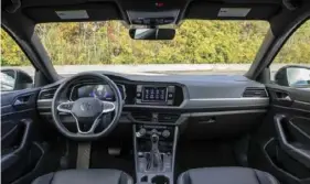  ?? ?? The interior of the 2024 Volkswagen Jetta retains a Spartan look, even more so with the digital speedomete­r.