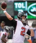  ?? / AP file-Bill Kostroun ?? Falcons quarterbac­k Matt Ryan warms up before a preseason NFL football game against the Jets.