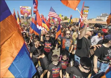  ?? Brian van der Brug Los Angeles Times ?? SOUTHERN CALIFORNIA is home to the largest Armenian community outside Armenia. Every year thousands march in L. A. to demand that the killings of 1.5 million Armenians be off icially recognized as a genocide.