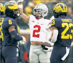  ?? Getty Images ?? SAY ANYTHING: Want broadcaste­rs to denounce me-first celebratio­ns like Ohio State’s Chris Olave’s, good luck. Need them to spout meaningles­s filler that leaves no gaps in between plays, you’re in luck.