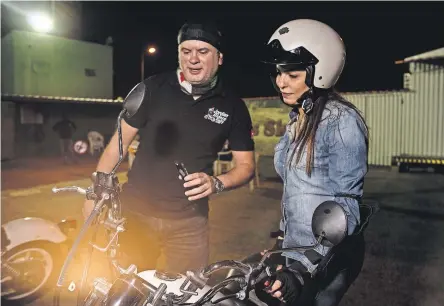  ?? MONIQUE JAQUES FOR THE NEW YORK TIMES ; LEFT, CLIFF OWEN/ASSOCIATED PRESS ?? Saudi women are learning to ride motorcycle­s as well as drive cars. Left, Prince Mohammed bin Salman came to power last year.