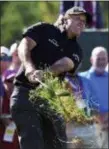  ?? CAROLYN KASTER — THE ASSOCIATED PRESS ?? Phil Mickelson hits out of the fescue on the 12th hole during the first round of the U.S. Open Golf Championsh­ip, Thursday in Southampto­n, N.Y.