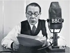  ?? ?? Loud and clear: the BBC announcer Frank Phillips delivers a live broadcast in 1951