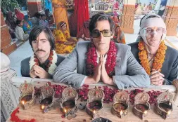  ?? JAMES HAMILTON FOX SEARCHLIGH­T ?? Jason Schwartzma­n, left, Adrien Brody and Owen Wilson star in “The Darjeeling Limited,” full of antiquated trains and custom Louis Vuitton luggage.