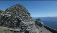  ?? VALERIE O’SULLIVAN — FAILTE IRELAND VIA AP ?? This undated image shows a beehive-shaped stone hut on Skellig Michael, a remote island off the coast of southwest Ireland. The island was home to an ancient order of Christian monks and is a UNESCO World Heritage site. Scenes in “The Last Jedi” were...