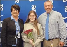  ?? CCPS ?? From left: Assistant Principal Kim Mullins, Trinity Tallant, and Assistant Principal Barret Blankenshi­p. Trinity plans to attend Savannah State University to major in forensic science.