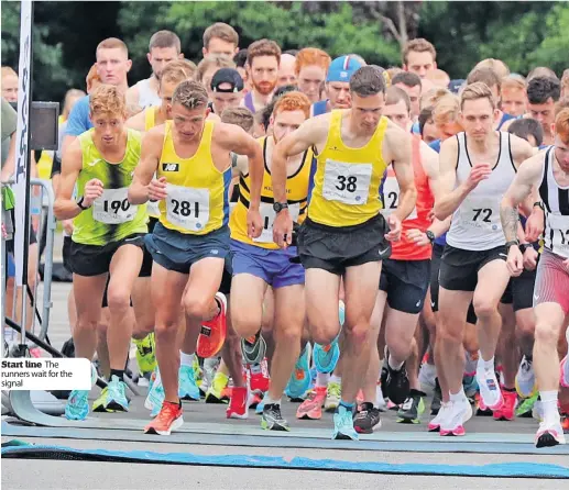  ??  ?? Start line The runners wait for the signal