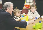  ?? THE CANADIAN PRESS ?? Paul Martin, when he was prime minister,
visits a childcare centre 2005.