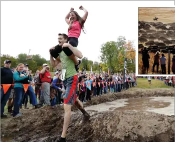  ??  ?? Left: In this file photo, Jessica Keefe, celebrates after her husband, Michael Keefe, of Madbury, N.H., made it through the mud pit during the North American Wife Carrying Championsh­ip at the Sunday River Ski Resort in Newry, Maine. The annual...