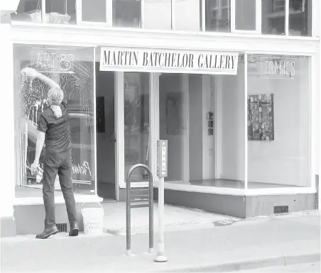  ?? ROBERT AMOS ?? Martin Batchelor keeps shop windows clean at his eponymous Cormorant Street gallery, which used to be the Barton-Leier Gallery.