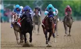  ?? Photograph: Nick Wass/AP ?? National Treasure, with jockey John Velazquez, front right, edges out Blazing Sevens, with jockey Irad Ortiz Jr, second from left, to win the148th running of the Preakness Stakes on Saturday in Baltimore.
