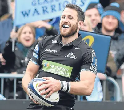  ?? Pictures: SNS Group. ?? Tommy Seymour is all smiles after scoring Glasgow’s second try.