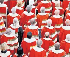  ?? ?? Ermine-clad: members of the House of Lords at the State Opening of Parliament