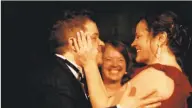  ?? Courtesy of Michelle McNamara’s estate / HBO ?? “I’ll Be Gone in the Dark” focuses largely on Michelle McNamara herself, seen here with actor Patton Oswalt on their wedding day.