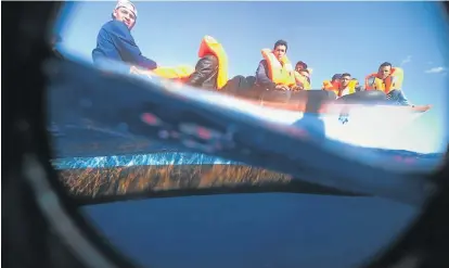  ?? Picture: AFP ?? HOPES DASHED: Migrants sit in their boat during a rescue operation in the Mediterran­ean Sea on Wednesday