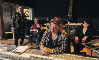  ?? GLENN BAGLO/FILES ?? Bassist Randy Rampage, left, works in the recording studio in 2008 with DOA, including frontman Joe Keithley, second from left, on the band’s Northern Avenger album, produced by Bob Rock, front.