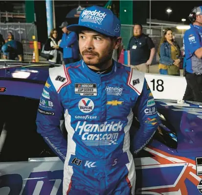  ?? JOHN RAOUX/AP ?? Kyle Larson stands by his car after qualifying for the Daytona 500 on Wednesday at Daytona Internatio­nal Speedway.