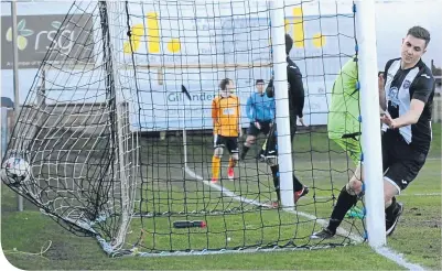  ??  ?? The net bulges as the prolific Paul Campbell nets again for Fraserburg­h against Fort William