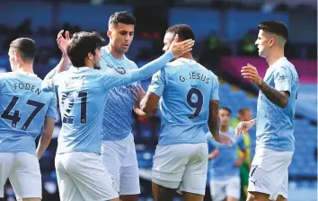  ?? AP ?? Pep Guardiola’s Manchester City target Champions League glory as they defend a 2-1 first-leg lead at home against Spanish giants Real Madrid on Friday.