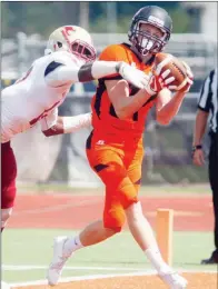  ?? PHOTOS BY MARK BUFFALO/RIVER VALLEY & OZARK EDITION ?? Hendrix receiver Michael Spainhour catches a touchdown pass while being defended by Austin College’s T.J. Melontree during first-quarter action in Conway.