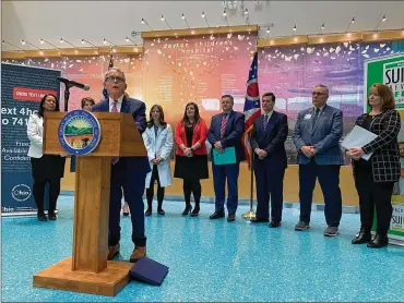  ?? LAURA A. BISCHOFF / STAFF ?? At an event at Dayton Children’s Hospital, Ohio Gov. Mike DeWine announced a plan to coordinate suicide prevention efforts across Ohio. The plan calls for raising awareness, integratin­g prevention practices across education, public safety and health care networks, focusing on at-risk groups and continuing to gather data.