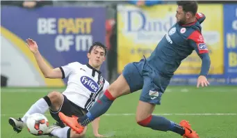  ??  ?? Jamie McGrath in action against Kyle Callan McFadden. Picture: Ken Finegan