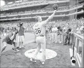  ?? Hunter Martin Getty Images ?? CHASE UTLEY of the Dodgers, who is retiring at season’s end, acknowledg­es fans during his last visit to Philadelph­ia, where he played 12-plus seasons.