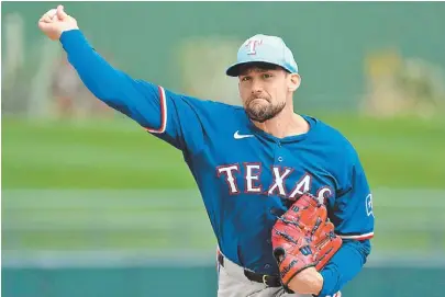  ?? REUTERS ?? Eovaldi y los Rangers inician ante Cachorros la defensa de su corona.