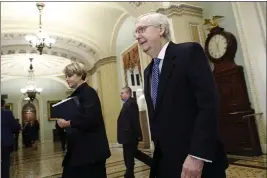  ?? STEVE HELBER — THE ASSOCIATED PRESS ?? Senate Majority Leader Mitch McConnell, R-Ky., walks to the Senate chamber at the Capitol Wednesday in Washington.