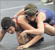  ?? Scott Herpst ?? Heritage’s Landon Albright takes down LFO’S Chandler Tisdale during the opening 106-pound bout of the Mccallie Invitation­al in Chattanoog­a on Friday. Albright, along with 195-pounder Alex Eacret, both made the championsh­ip semifinals for the Generals, who ended up in 11th place overall in the 20-team tournament.