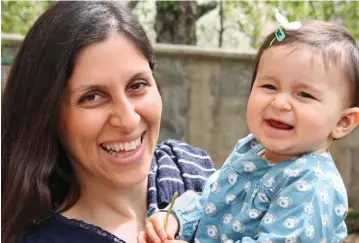  ??  ?? Imprisoned: Nazanin Zaghari-Ratcliffe, pictured with her daughter Gabriella