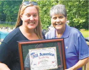  ?? CONTRIBUTE­D PHOTO ?? Former athletes, like Rachael Pursell, left, shown in this older photo, have had their lives touched by former Northampto­n High swim coach Gwen Whildin, who died in January, and are hoping to get the school district’s natatorium named in her honor.