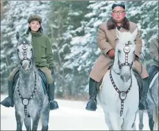  ??  ?? SADDLE UP! Kim Yo-jong (riding on sacred Mount Paektu with bro Kim Jong-un) joined talks with South Korea’s Moon Jae-in (top).