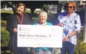  ?? COURTESY OF BROTHER BENNO’S ?? Brother Benno’s Auxiliary President Joyce Cerimele (center) and Vice President Doris Nyman (right) present a check for $40,602 to Brother Benno Foundation President Kathleen Diehlmann from the third annual golf tournament and other auxiliary fundraisin­g efforts last year.