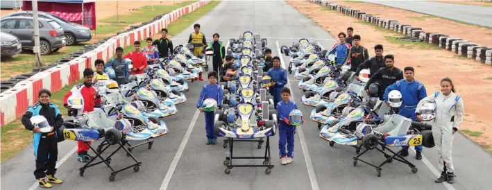  ??  ?? Participan­ts pose ahead of the MSports X- 30 Karting Challenge in Bengaluru.