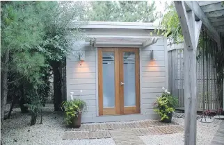  ?? OF SUMMERWOOD PRODUCTS PHOTOS COURTESY ?? Urban homeowners with limited backyard space can still find room for an attractive, contempora­ry-looking sheshed that can be used as home office, writing space, craft studio or simple getaway spot.