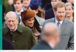  ?? AFP PIC ?? (From left) Prince Philip, Meghan Markle and Prince Harry in 2017.