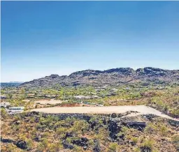  ?? PHOENIX ?? The $6.99 million sale of 2.25 acres of vacant land on Paradise Valley's Mummy Mountain set a record for the highest price for a single-family lot.