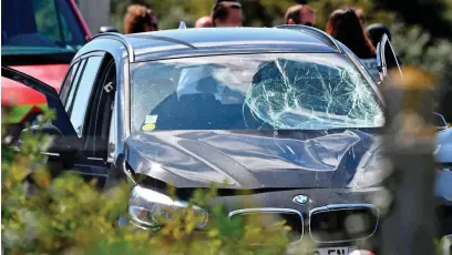  ??  ?? Shattered: The BMW yesterday after the suspect drove 300km from Paris following the attack