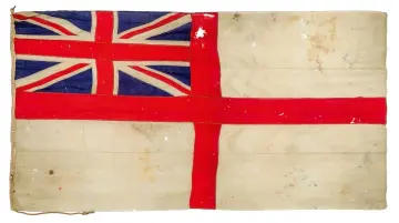  ?? ?? HMS Exeter’s White Ensign, which saw action in 1939, was hoisted well above estimate at Charles Miller’s