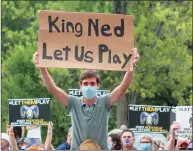  ?? Christian Abraham / Hearst Connecticu­t Media ?? A youth holds a sign that reads, “King Ned Let Us Play” during a rally held on the grounds of the State Capitol in Hartford on Wednesday.