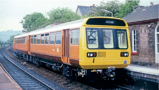  ??  ?? The original ‘Pacer', No. 142001, in Greater Manchester PTE Orange and Black livery, heads north through Furness Vale on the Buxton line with a test working on June 19, 1985 – a month after it was unveiled at Derby.